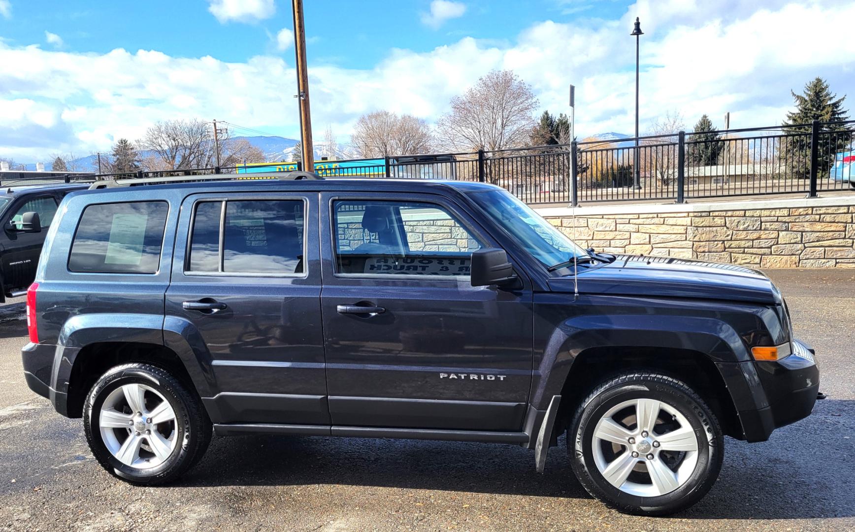 2014 Blue /Black Jeep Patriot Latittude (1C4NJRFB7ED) with an 2.4L I4 engine, 6 Speed Automatic transmission, located at 450 N Russell, Missoula, MT, 59801, (406) 543-6600, 46.874496, -114.017433 - Photo#3